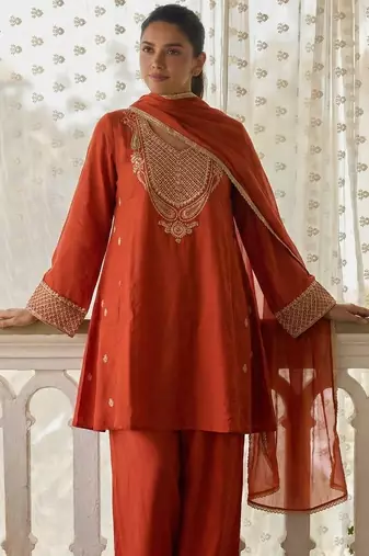 Orange cotton silk zari embroidered & sequins free size suit