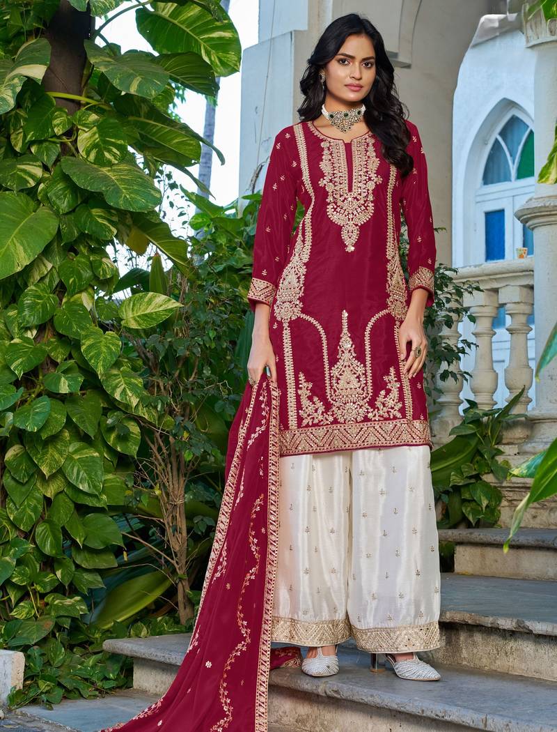 Red fancy fabric embroidered free size suit