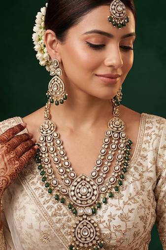Royal polki kundan green stone layered necklace set with maang tikka