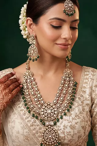Royal polki kundan green stone layered necklace set with maang tikka