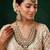 Royal polki kundan green stone layered necklace set with maang tikka