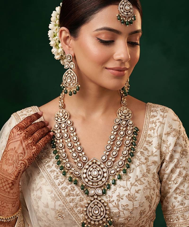 Royal polki kundan green stone layered necklace set with maang tikka