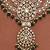 Royal polki kundan green stone layered necklace set with maang tikka