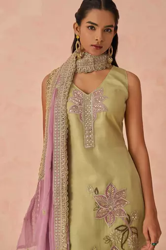 Green fancy fabric zari/thraed embroidery   sequins & stone free size suit