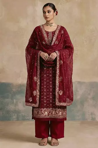 Magenta georgette embroidered top with multi thread and sequins work along with khatli work on neckline free size suit