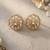 Gold plated kundan stud earrings