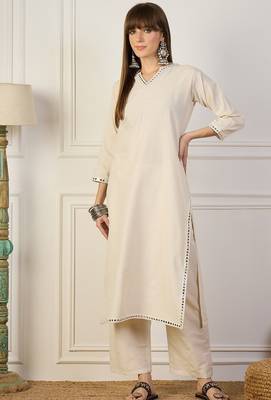 Beige blended cotton solid & mirror work on nackeline free size suit 1