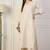 Beige blended cotton solid & mirror work on nackeline free size suit
