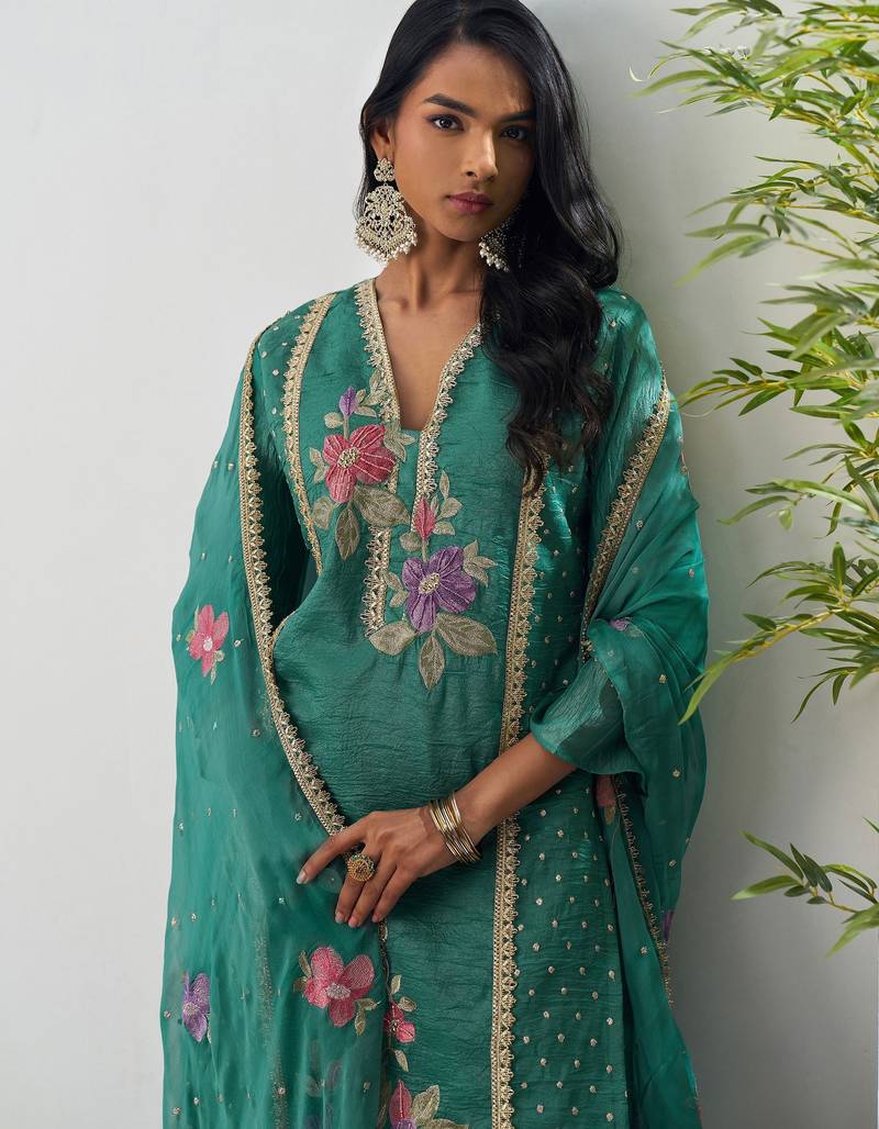 Green fancy fabric thraed embroidery   beads & sequins free size suit