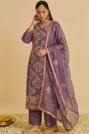 Purple silk blend embroidered   multi thread and sequins work heavy floral motifs gold zari work free size suit