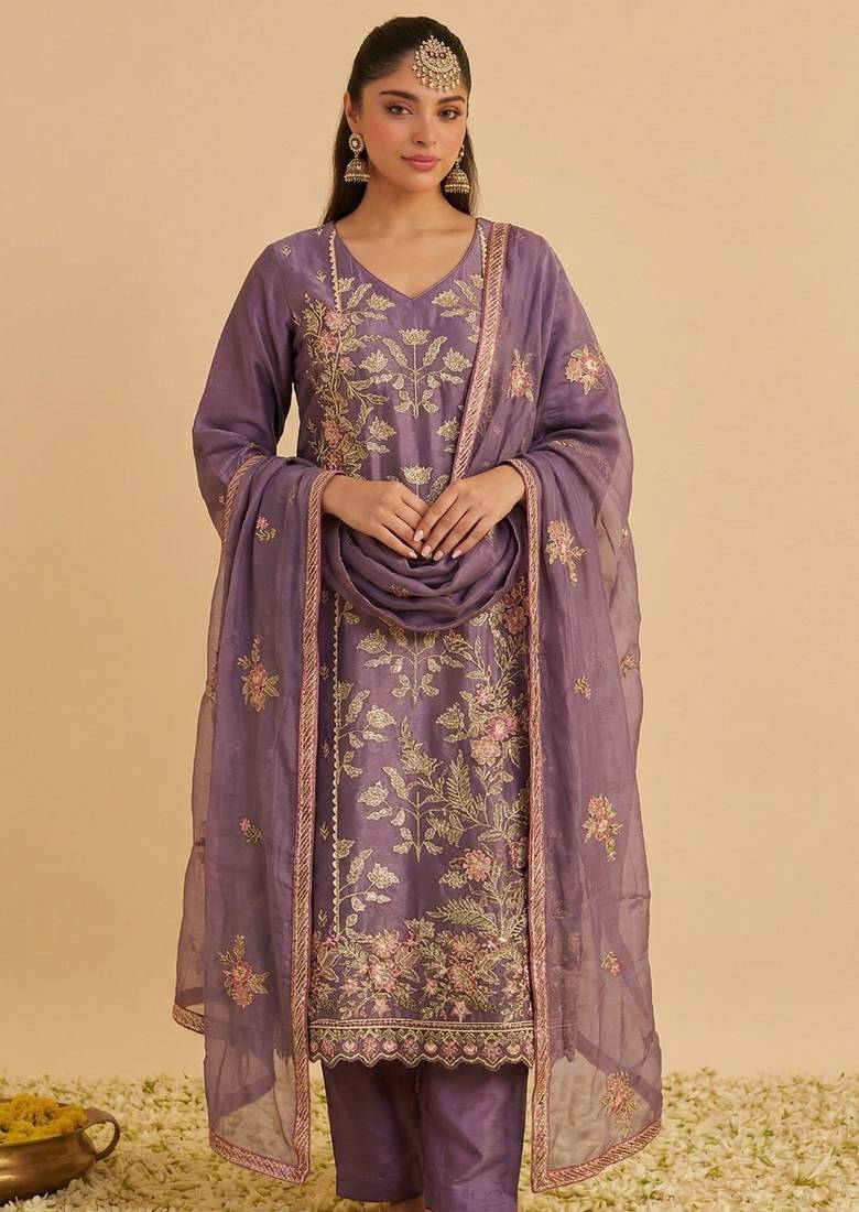 Purple silk blend embroidered   multi thread and sequins work heavy floral motifs gold zari work free size suit