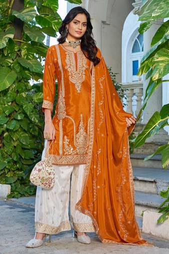 Orange fancy fabric embroidered free size suit