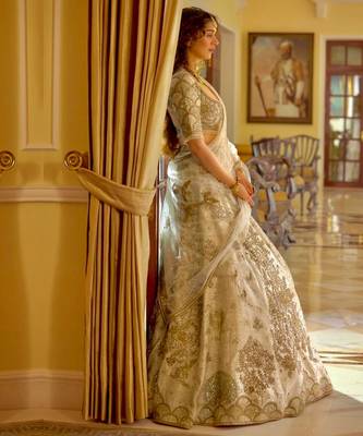 beige silk blend embroidered traditional lehenga choli 4