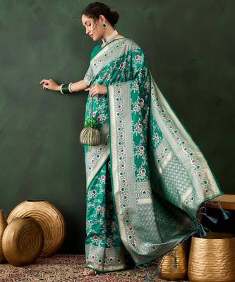 Green silk blend woven saree with zari work 1