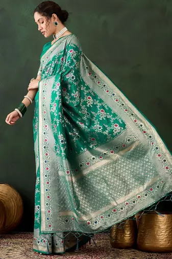 Green silk blend woven saree with zari work