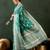 Green silk blend woven saree with zari work