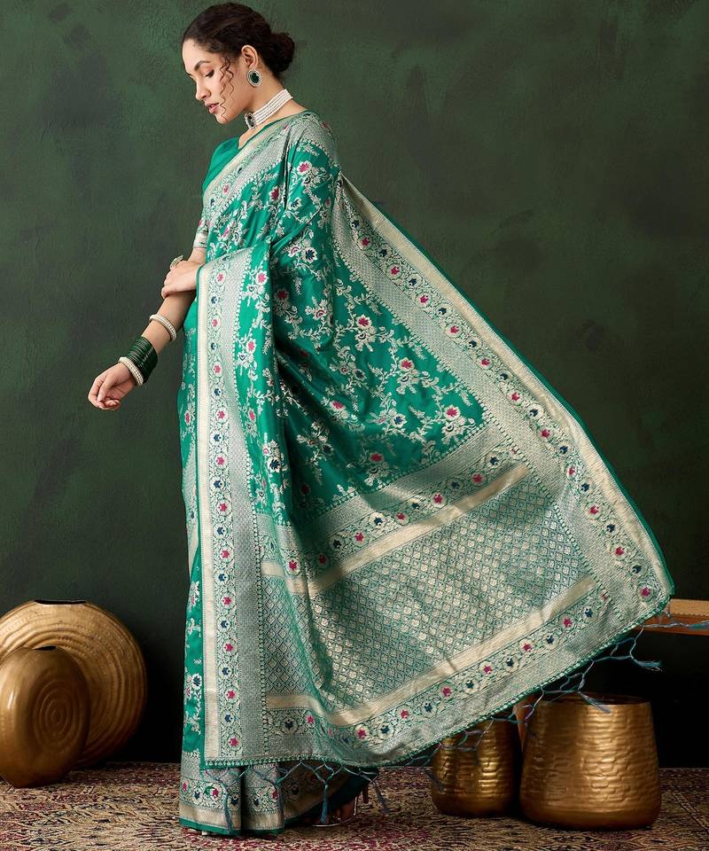 Green silk blend woven saree with zari work