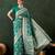 Green silk blend woven saree with zari work