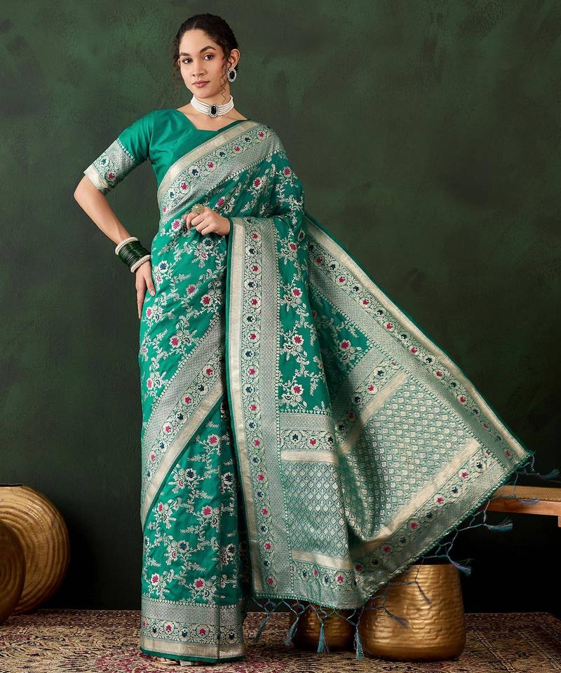 Green silk blend woven saree with zari work