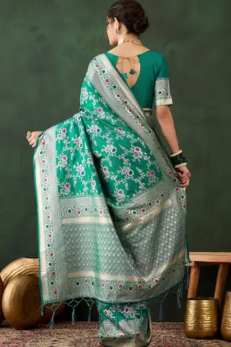 Green silk blend woven saree with zari work