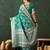 Green silk blend woven saree with zari work