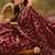 Maroon silk blend woven saree with zari work