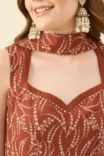 Women rust printed kurta with palazzos & dupatta