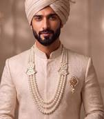 White pearl golden plated wedding mala with groom brooch