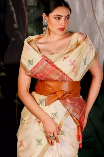 Vaidehi- Saree in Tissue fabric- The Saree is elevated with Zariwork embroidery- It comes with an Unstitched blouse