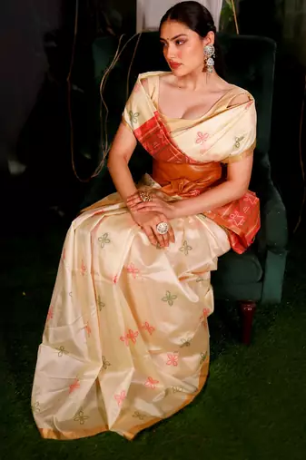 Vaidehi- Saree in Tissue fabric- The Saree is elevated with Zariwork embroidery- It comes with an Unstitched blouse