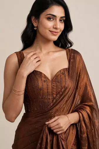 Designer satin saree with floral embellished blouse
