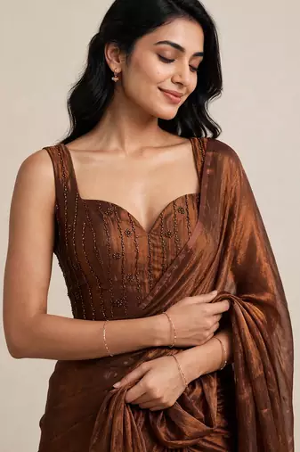 Designer satin saree with floral embellished blouse