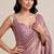 Rich satin saree with elegant floral bead work blouse