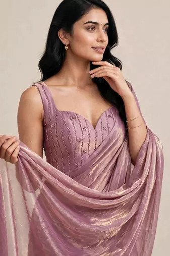Rich satin saree with elegant floral bead work blouse