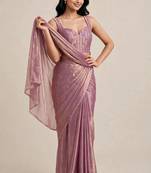 Rich satin saree with elegant floral bead work blouse
