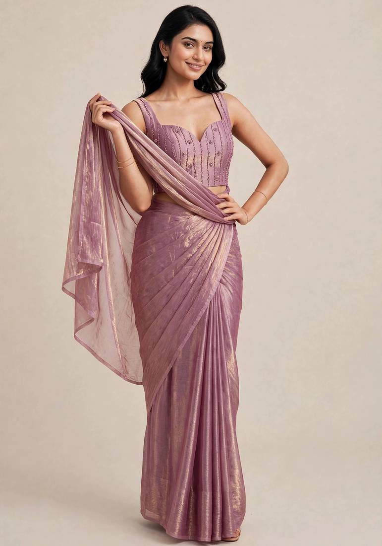 Rich satin saree with elegant floral bead work blouse