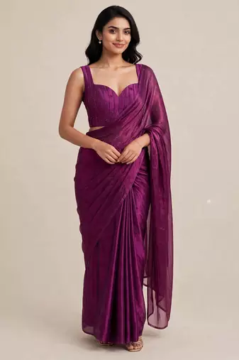 Partywear satin saree with intricate bead work blouse