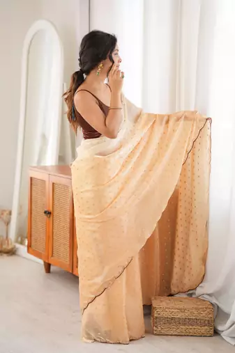 Peach premium satin saree with golden butti work & designer border