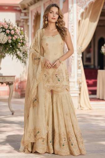 Cream silk embroidered sharara set