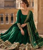 Green silk blend embroidered flared gown set