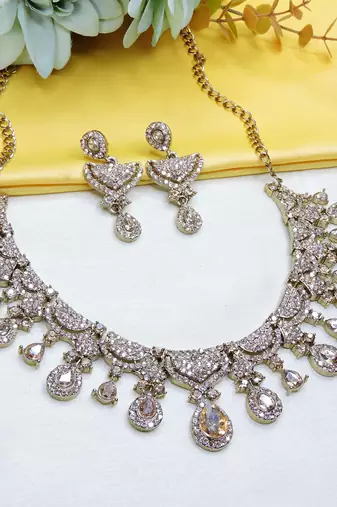 Gold yellow gold premium designer american diamond and stone work necklace set