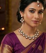 Purple yellow gold premium designer american diamond and stone work necklace set