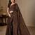 Brown color silk blend val beads work saree