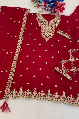 Rani pink silk blend zari work semi stitched salwar suits