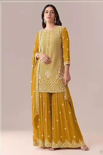 Mustard yellow faux georgette beads semi stitched salwar suits