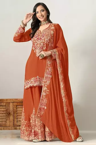 Rust orange silk blend floral print semi stitched salwar suits
