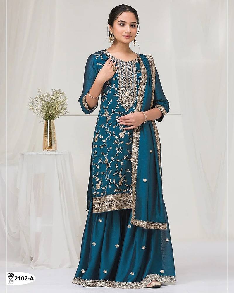 Peacock blue fancy fabric hand embroidery semi stitched salwar suits
