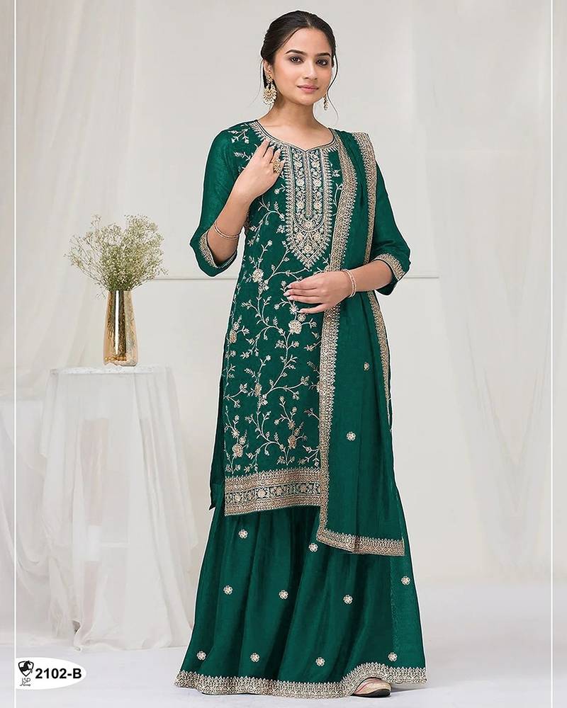 Emerald green fancy fabric hand embroidery semi stitched salwar suits