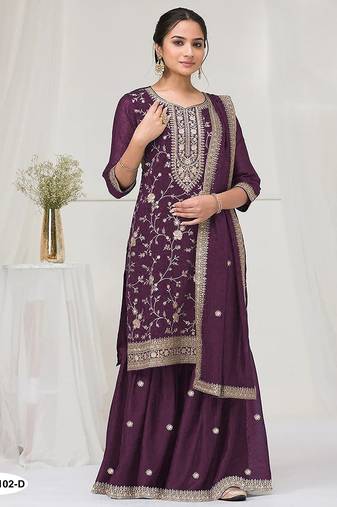 Deep purple fancy fabric hand embroidery semi stitched salwar suits