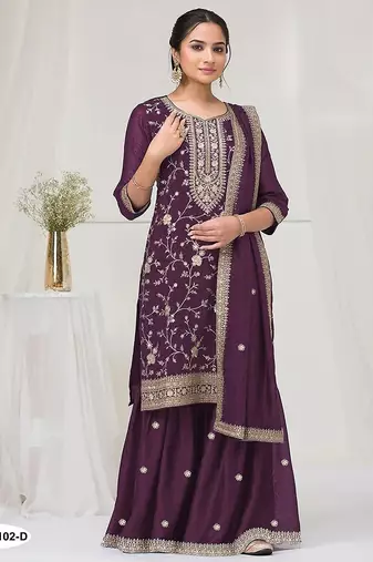 Deep purple fancy fabric hand embroidery semi stitched salwar suits